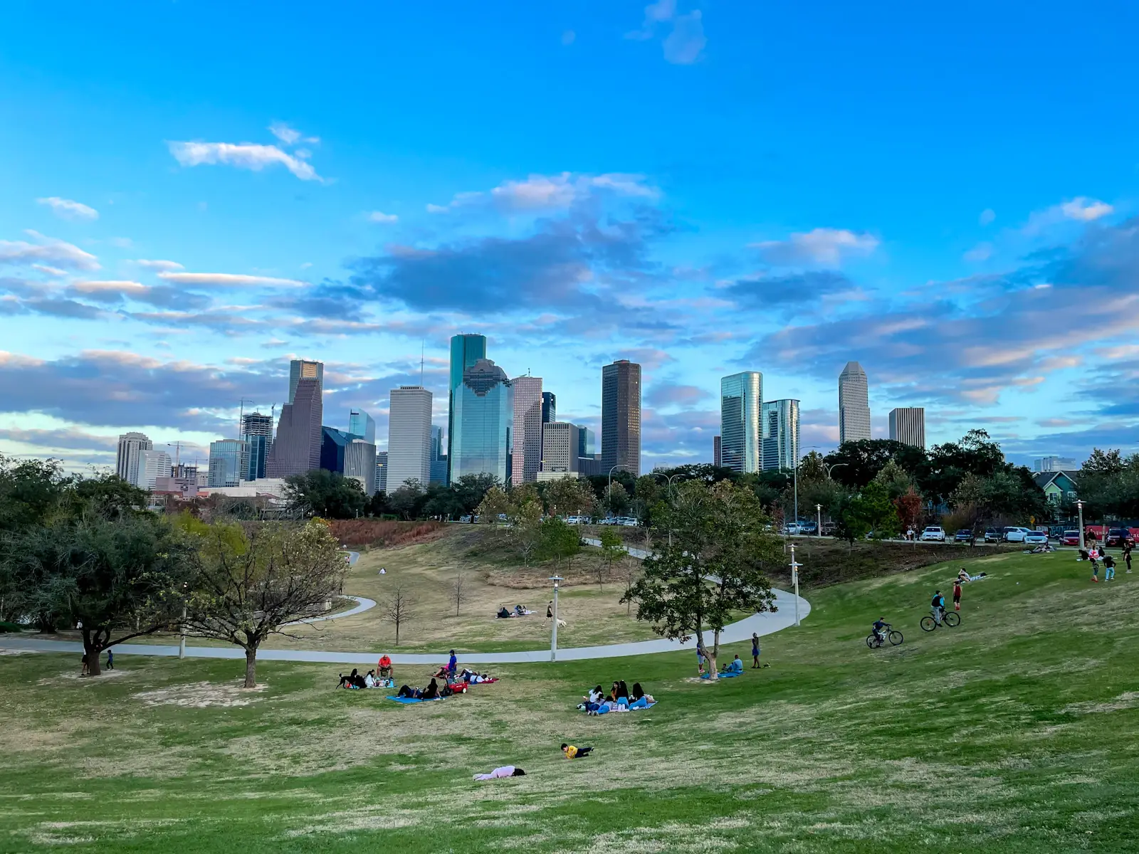 Downtown Houston office towers rising behind a city park
